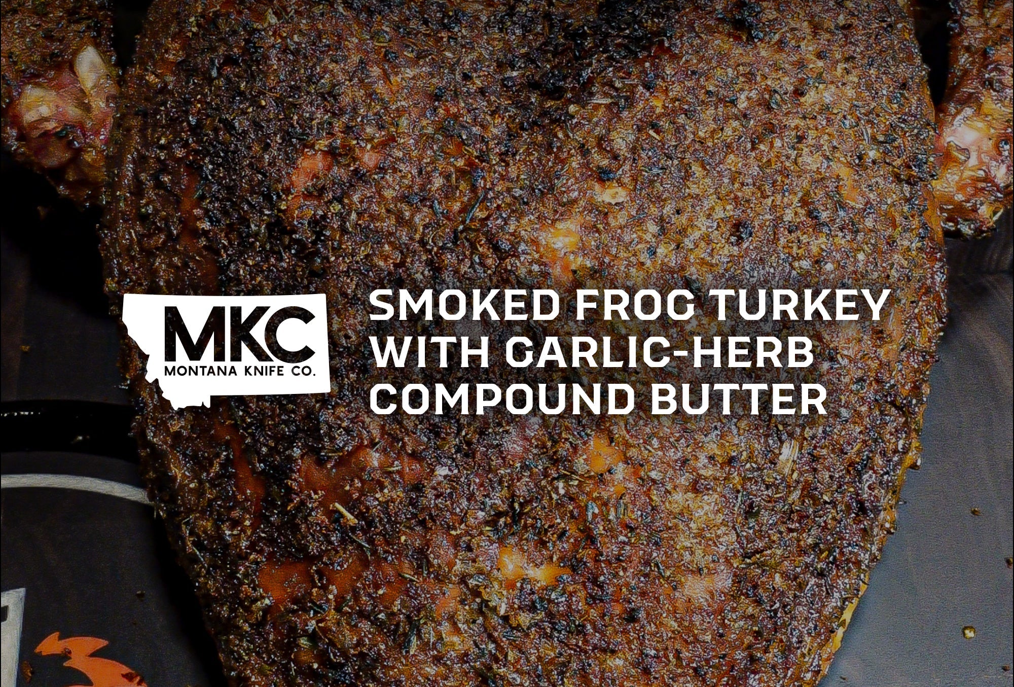 Close-up of smoked frog-style turkey, with crispy skin and Cajun garlic-herb seasoning.