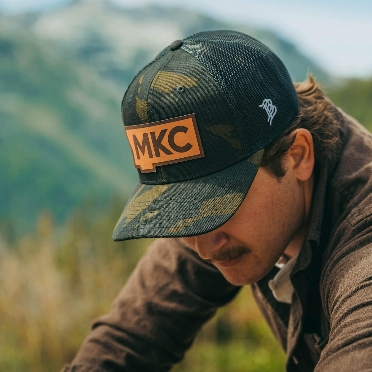 MKC STATE PATCH - CAMO TRUCKER SNAPBACK