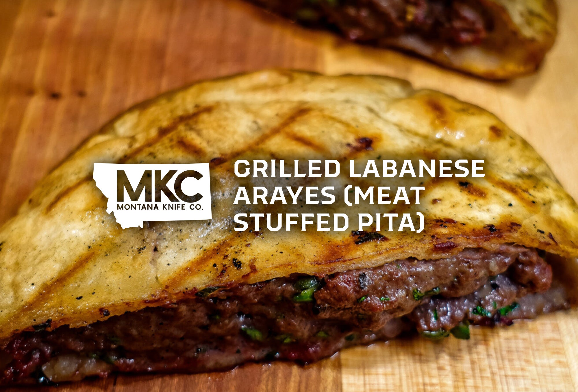Grilled Lebanese arayes with seasoned beef and herbs stuffed in charred pita.