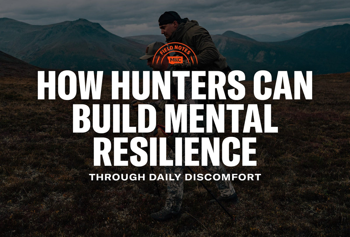 Two hunters in rugged mountain terrain with MKC text about building mental resilience through daily discomfort.