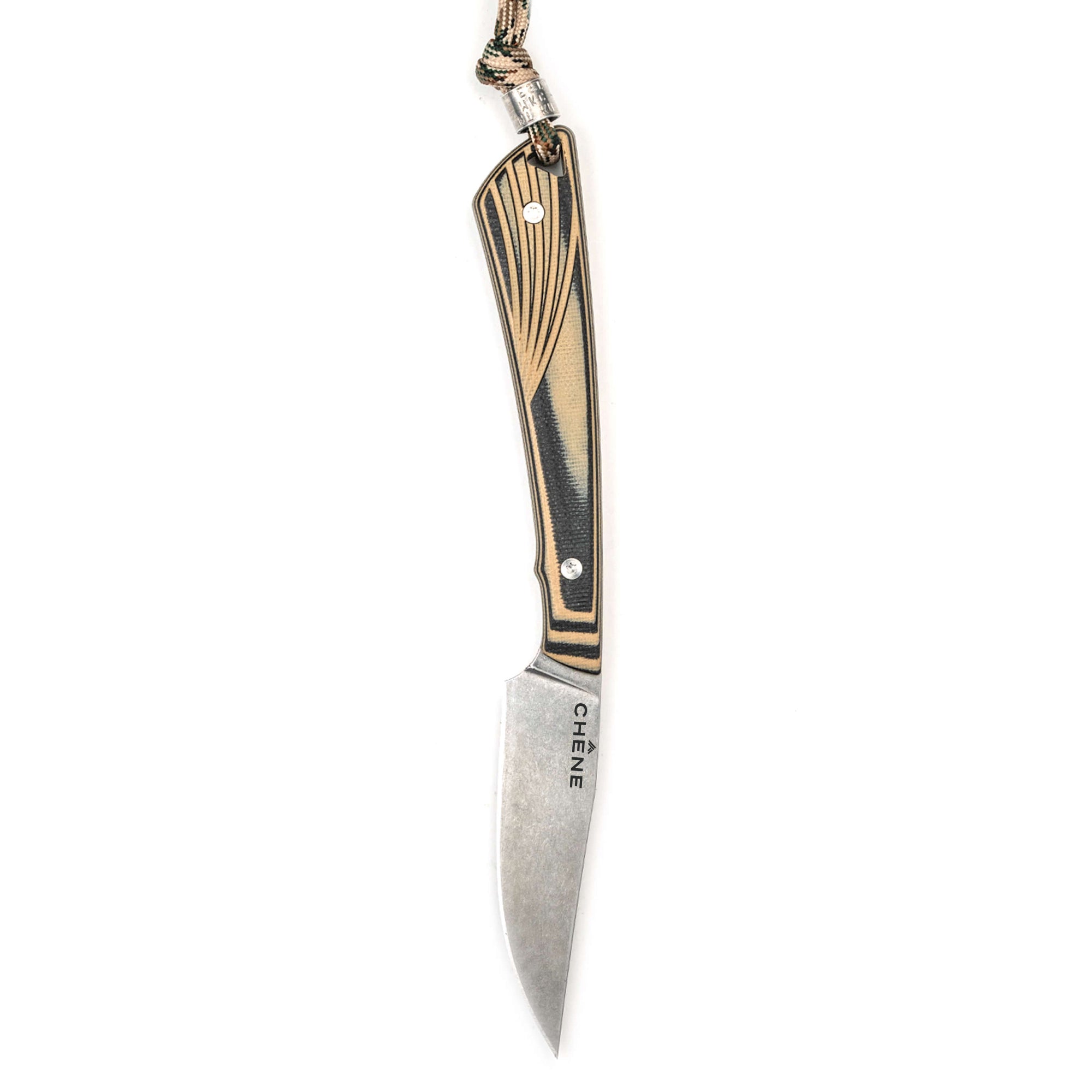 Chêne Freezout knife featuring a sleek design with a black and gold handle and a sharp stainless steel blade.