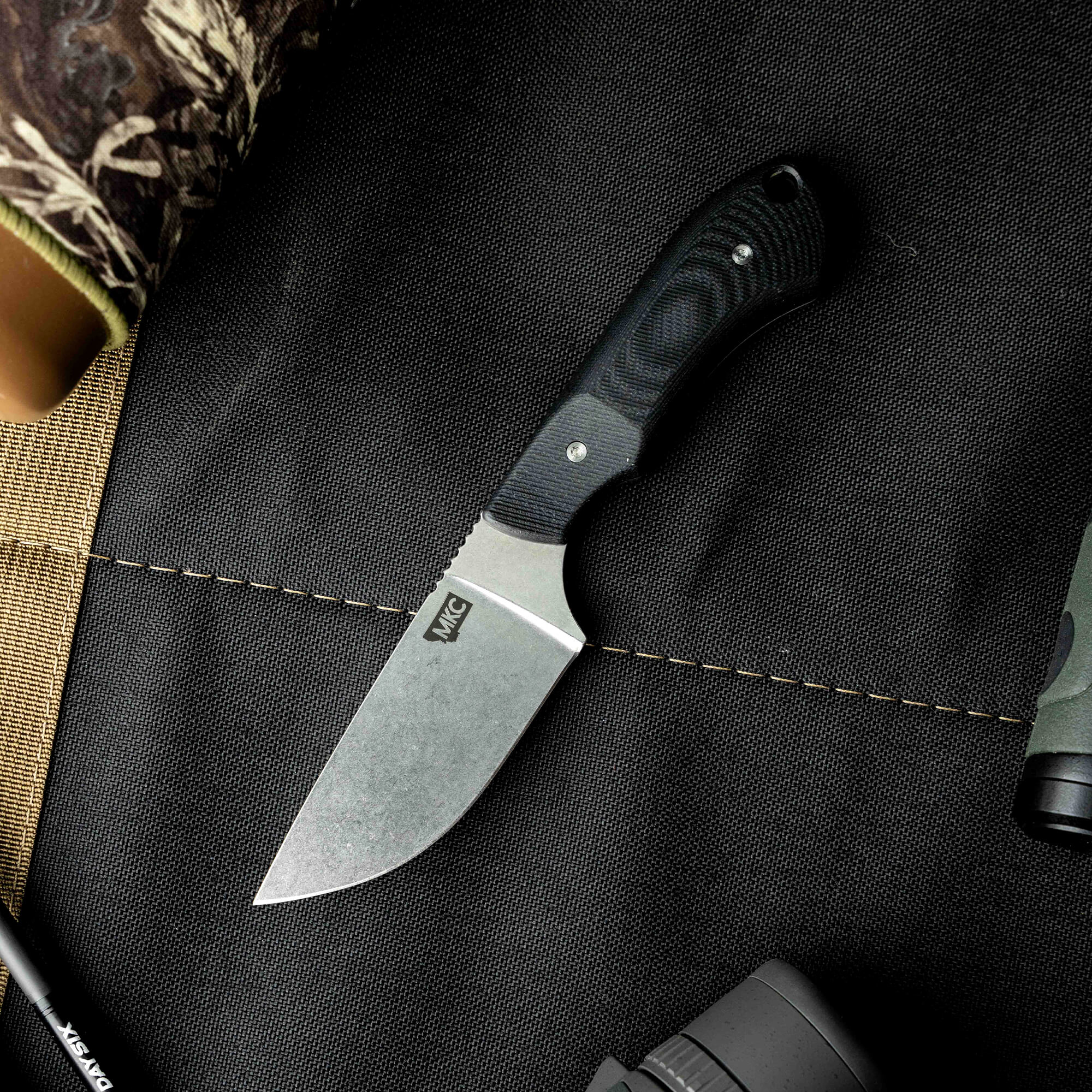 Montana Knife Company's Live Wild Elk Knife features a durable blade and ergonomic handle, ideal for outdoor enthusiasts.