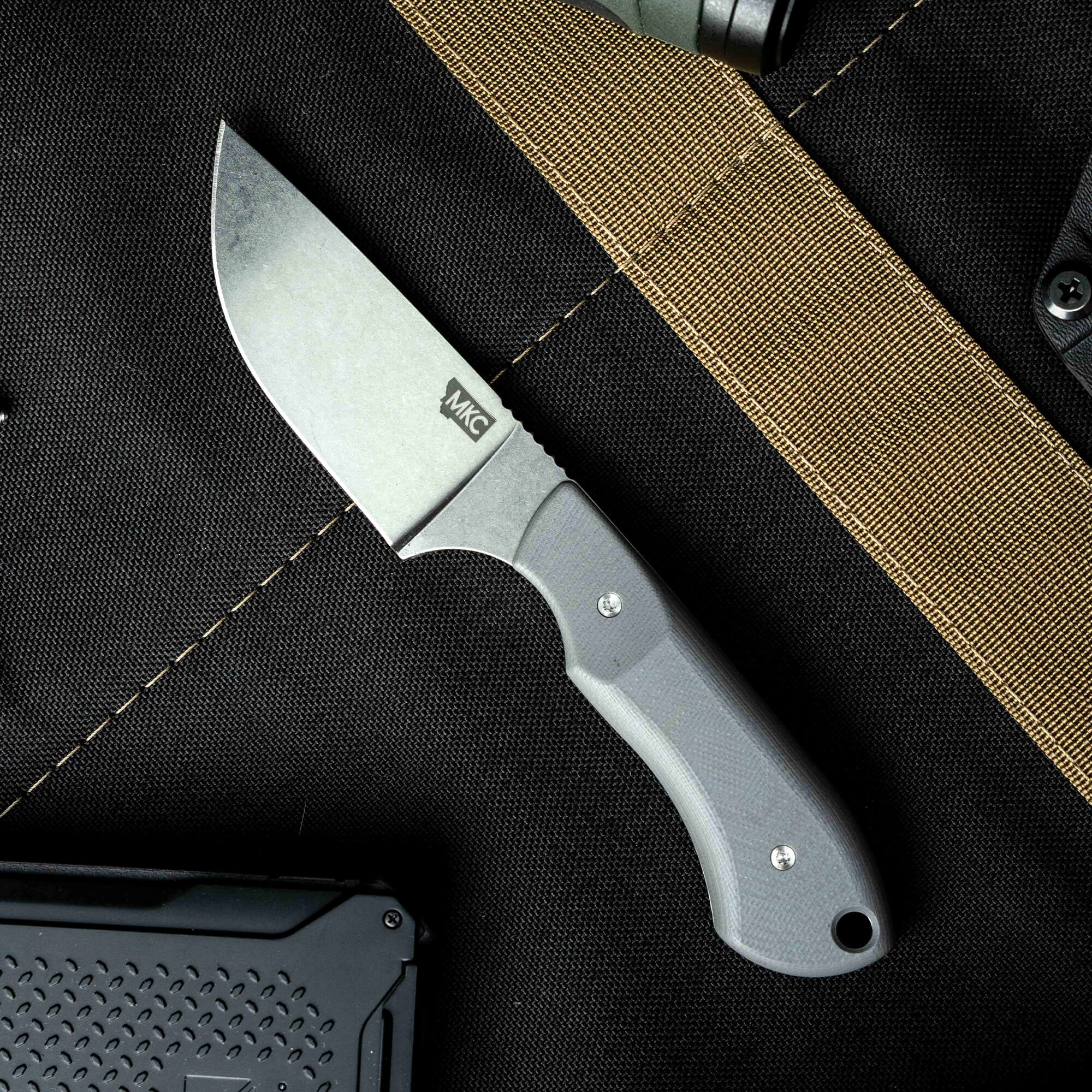 Montana Knife Company's Live Wild Elk Knife features a durable blade and ergonomic handle, ideal for outdoor use.