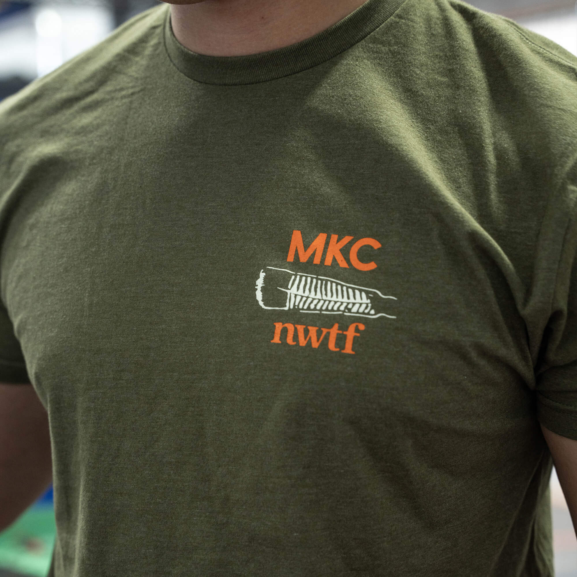 MKC x NWTF COLLAB FUNDRAISER TEE 2.0 - MILITARY GREEN