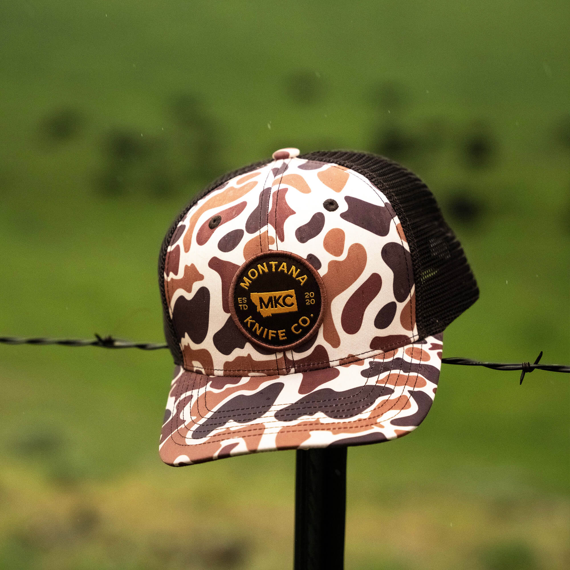 MKC VINTAGE CAMO TRUCKER HAT