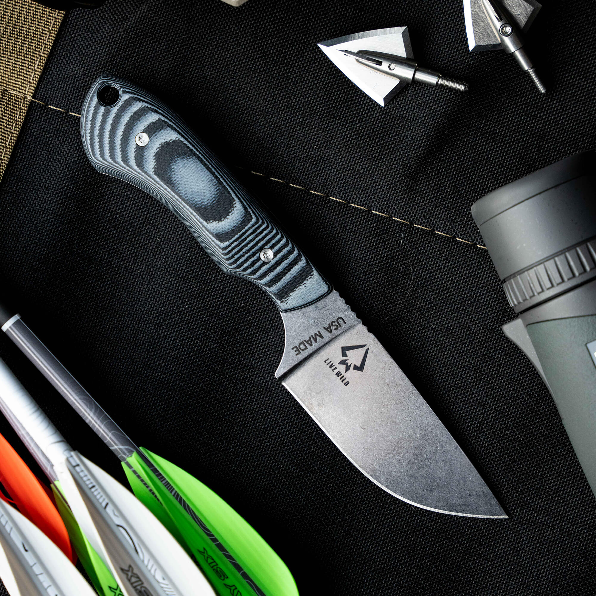 Montana Knife Company's LIVE WILD Elk Knife features a sleek blade and durable handle, ideal for outdoor enthusiasts.